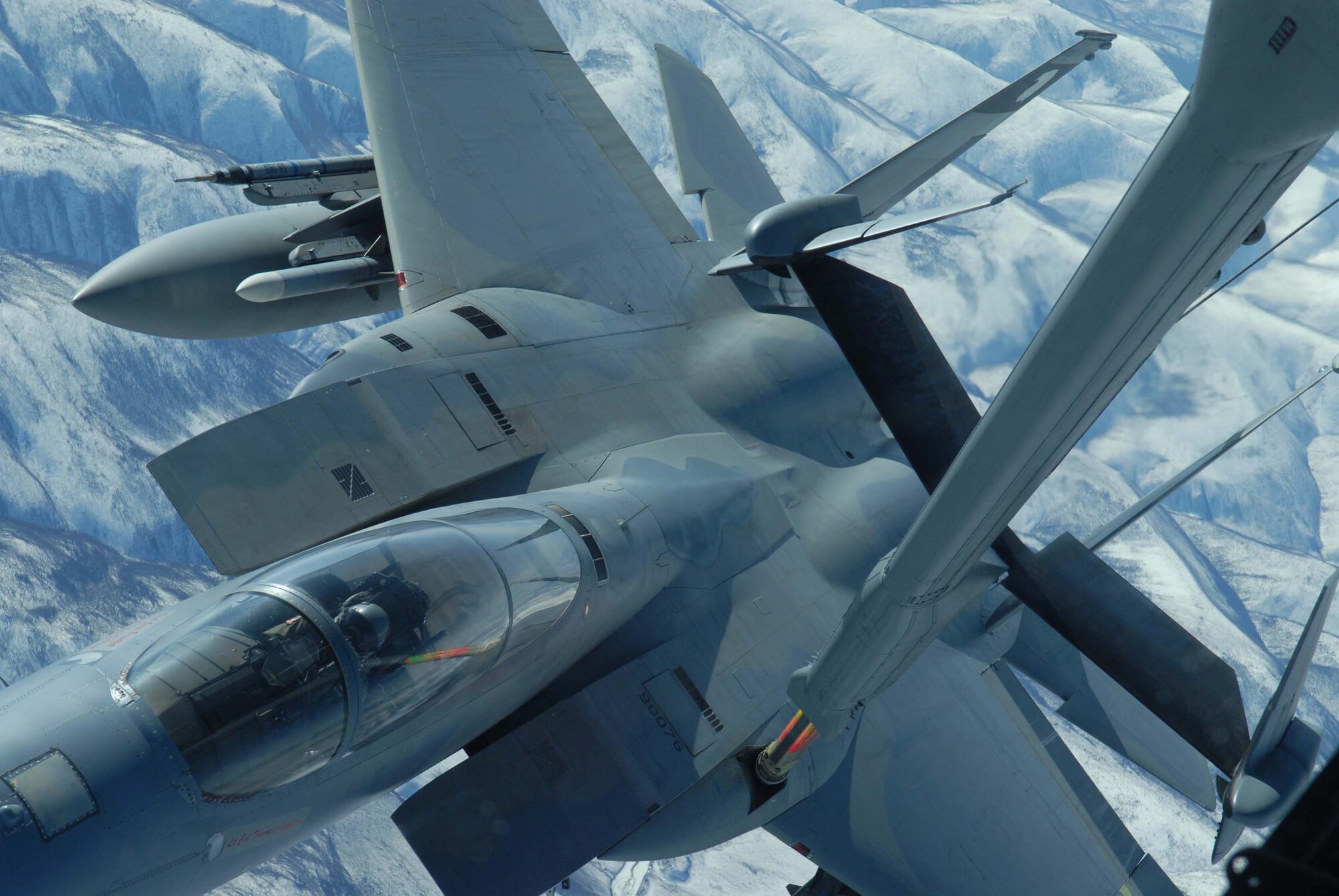 EIELSON AIR FORCE BASE, Alaska -- An F-15 Strike Eagle, 60th Fighter Squadron, Eglin AFB, Florida, receives fuel from a KC-10 extender over the Pacific Alaska Range Complex on April 18 during Red Flag-Alaska 07-1. Red Flag-Alaska is a Pacific Air Forces-directed field training exercise for U.S. forces flown under simulated air combat conditions. It is conducted on the Pacific Alaskan Range Complex with air operations flown out of Eielson and Elmendorf Air Force Bases. (U.S. Air Force Photo by Airman 1st Class Jonathan Snyder) 