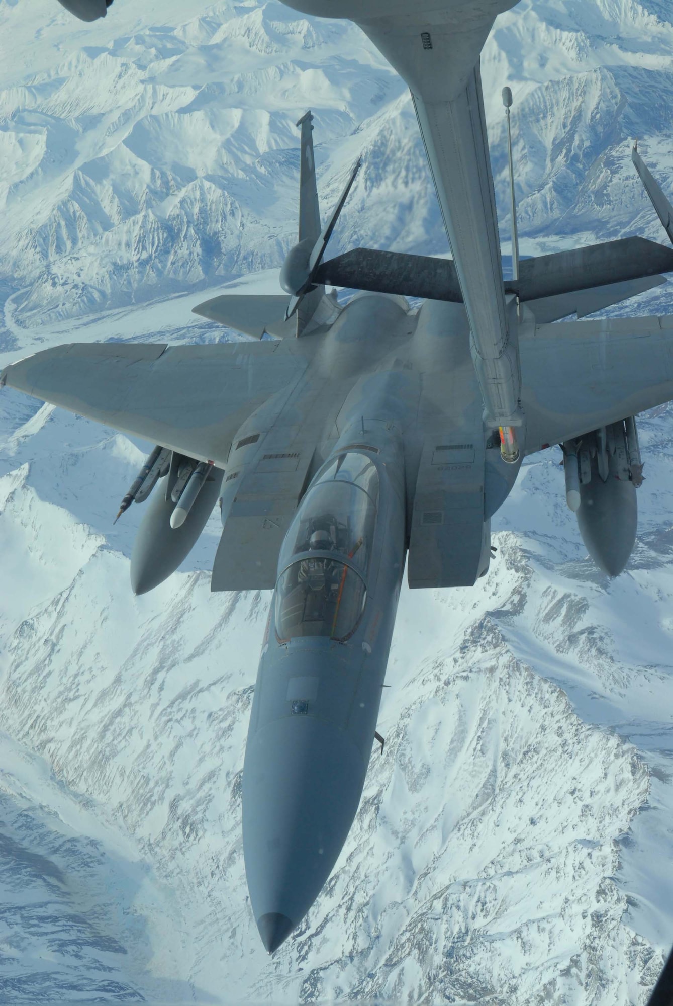 EIELSON AIR FORCE BASE, Alaska -- An F-15 Strike Eagle, 60th Fighter Squadron, Eglin AFB, Florida, positions itself to make contact with a KC-10 extender over the Pacific Alaska Range Complex on April 18 during Red Flag-Alaska 07-1. Red Flag-Alaska is a Pacific Air Forces-directed field training exercise for U.S. forces flown under simulated air combat conditions. It is conducted on the Pacific Alaskan Range Complex with air operations flown out of Eielson and Elmendorf Air Force Bases. (U.S. Air Force Photo by Airman 1st Class Jonathan Snyder) (Released)