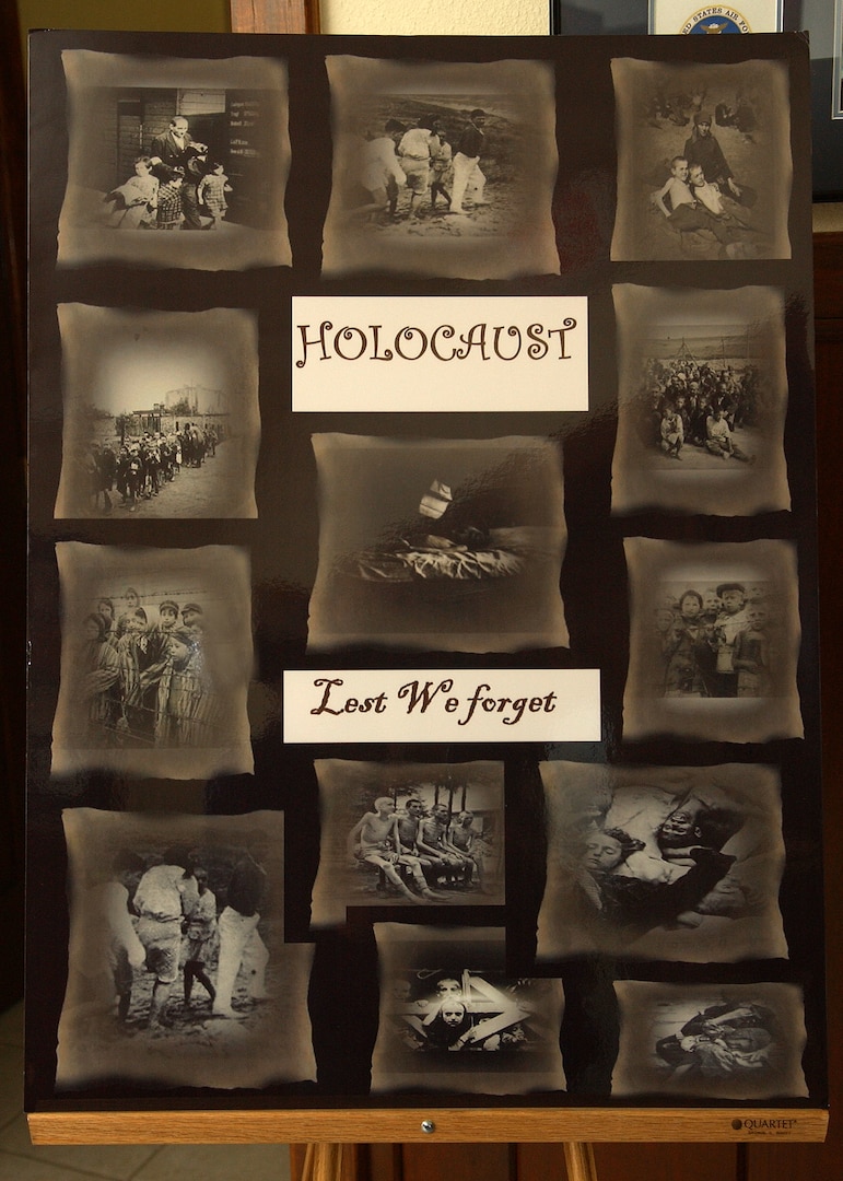 A poster depicts various aspects of the Holocaust, an event which resulted in the death of 6 million European Jews, including more than 1 million Jewish children. (USAF photo by Alan Boedeker)                               