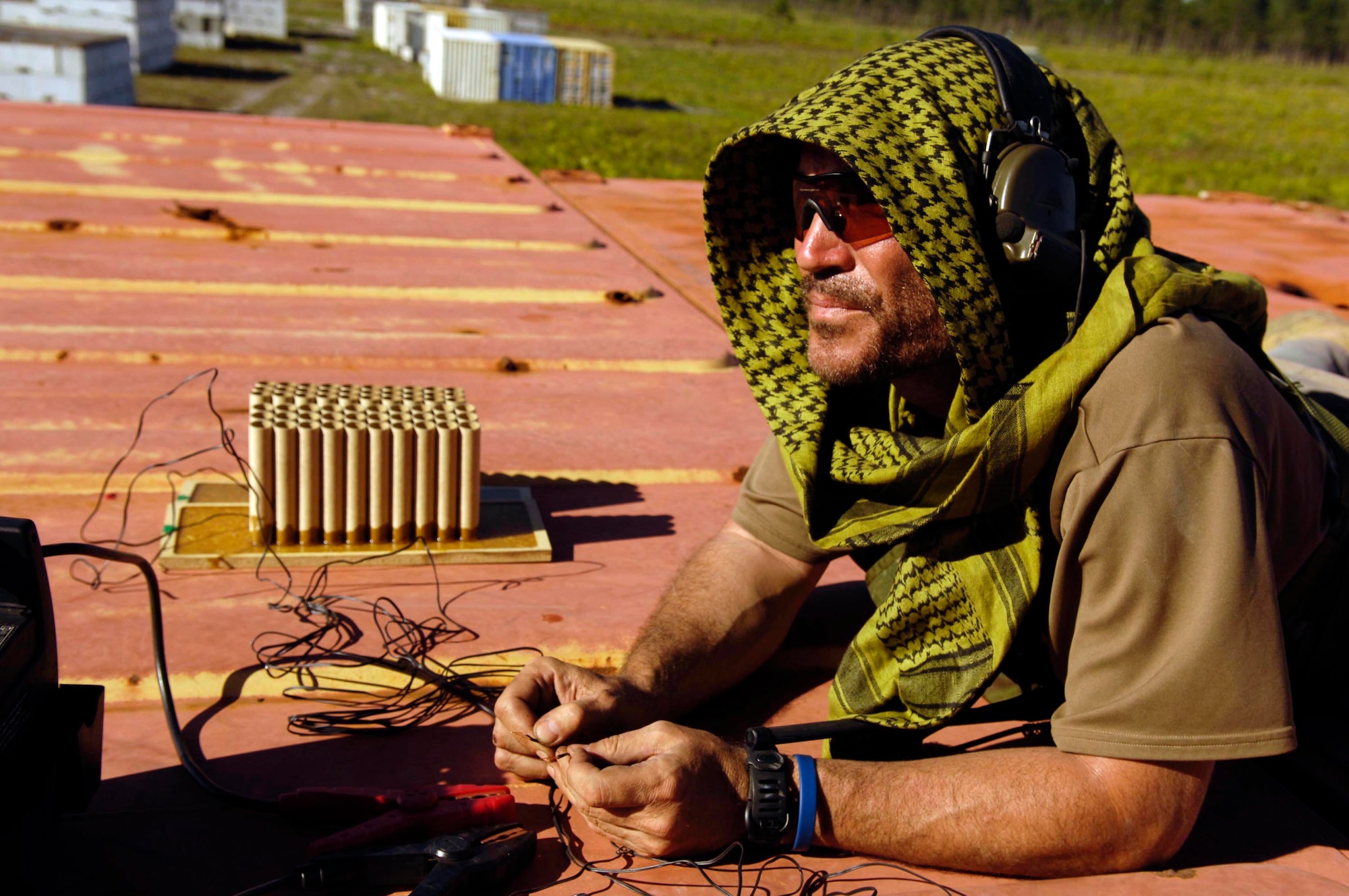Tech. Sgt. Steve Smallwood, Joint Tactical Air Control party member from the 19th Air Support Operations Squadron,Fort Campbell, Ky., is portraying Opposing force (Opfor) waiting to attack a convoy in a village at Avon Park Air Ground Training Complex, April 17. (U.S. Air Force photo/Staff Sgt. Stephen J. Otero)