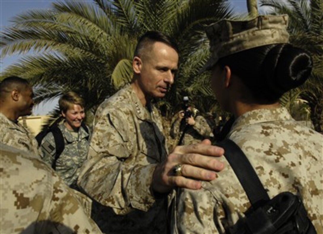 Chairman of the Joint Chiefs of Staff U.S. Marine Gen. Peter Pace meets with Marines at Camp Fallujah, Iraq, April 19, 2007.  