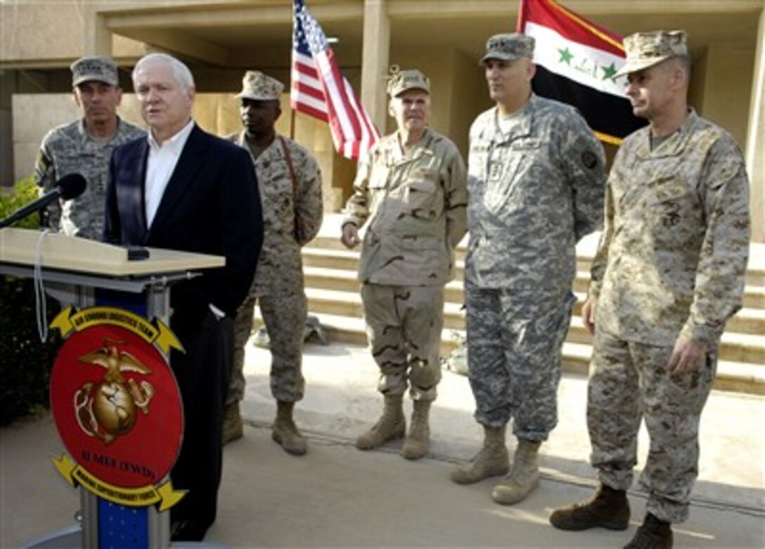 Secretary of Defense Robert M. Gates conducts a press conference at Camp Fallujah, Iraq, on April 19, 2007.  Gates and Chairman of the Joint Chiefs of Staff Gen. Peter Pace (right), U.S. Marine Corps, are in Iraq to meet with Army Gen. David Petraeus (left), commander Multinational Force Iraq, Maj. Gen. Walter Gaskin (3rd from left), U.S. Marine Corps, Commander of Multinational Forces-Iraq West, Navy Adm. William Fallon (center), commander of U.S. Central Command, and Army Lt. Gen. Ray Odierno (2nd from right), commander Multinational Corps Iraq.  