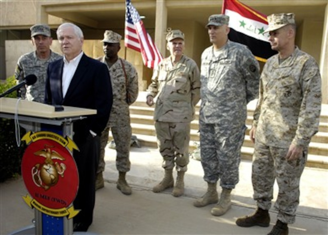 Secretary of Defense Robert M. Gates conducts a press conference at Camp Fallujah, Iraq, on April 19, 2007.  Gates and Chairman of the Joint Chiefs of Staff Gen. Peter Pace (right), U.S. Marine Corps, are in Iraq to meet with Army Gen. David Petraeus (left), commander Multinational Force Iraq, Maj. Gen. Walter Gaskin (3rd from left), U.S. Marine Corps, Commander of Multinational Forces-Iraq West, Navy Adm. William Fallon (center), commander of U.S. Central Command, and Army Lt. Gen. Ray Odierno (2nd from right), commander Multinational Corps Iraq.  