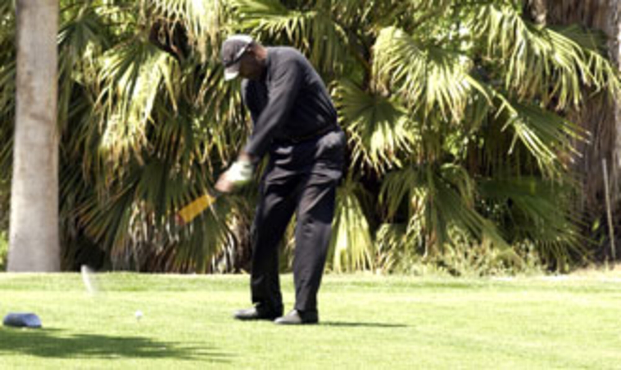 Bill Kimble, Fourth Combat Camera Squadron, tees off at the 18th hole.  March Air Reserve Base captured the winner’s trophy at Broken Shaft Golf tournament against the Greater Riverside Chambers of Commerce. The Broken Shaft Tournament is an annual event between the two teams and this year, 52 people participated.  The base ended eight strokes ahead taking the low net total with 1903.  (U.S. Air Force photo by Staff Sgt. Amy Abbott, 452 AMW)