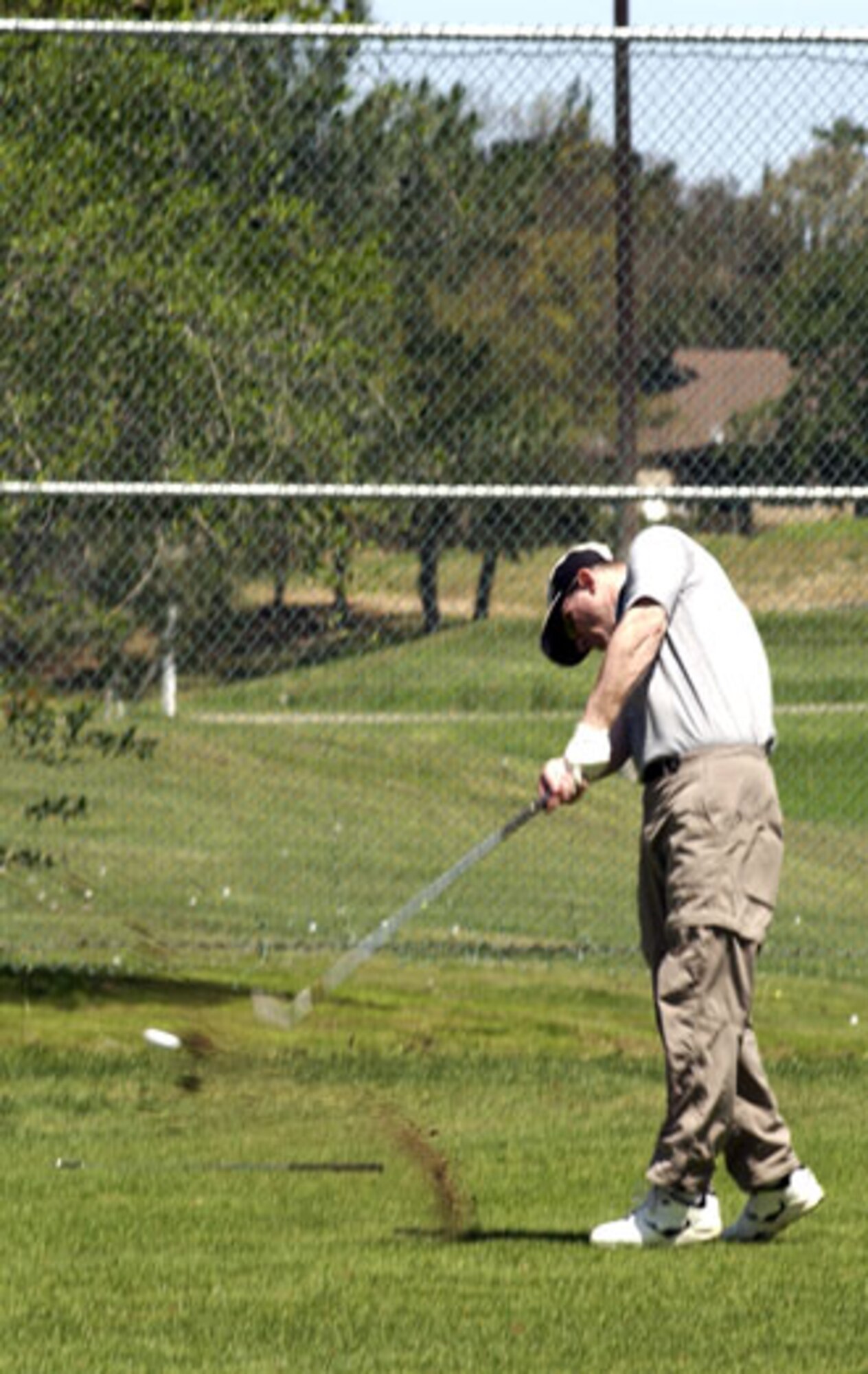 Lt. Col. John Jenson, 120th Fighter Wing Detachment commander, tees off. March Air Reserve Base captured the winner’s trophy at Broken Shaft Golf tournament against the Greater Riverside Chambers of Commerce. The Broken Shaft Tournament is an annual event between the two teams and this year, 52 people participated.  The base ended eight strokes ahead taking the low net total with 1903.  (U.S. Air Force photo by Staff Sgt. Amy Abbott, 452 AMW)