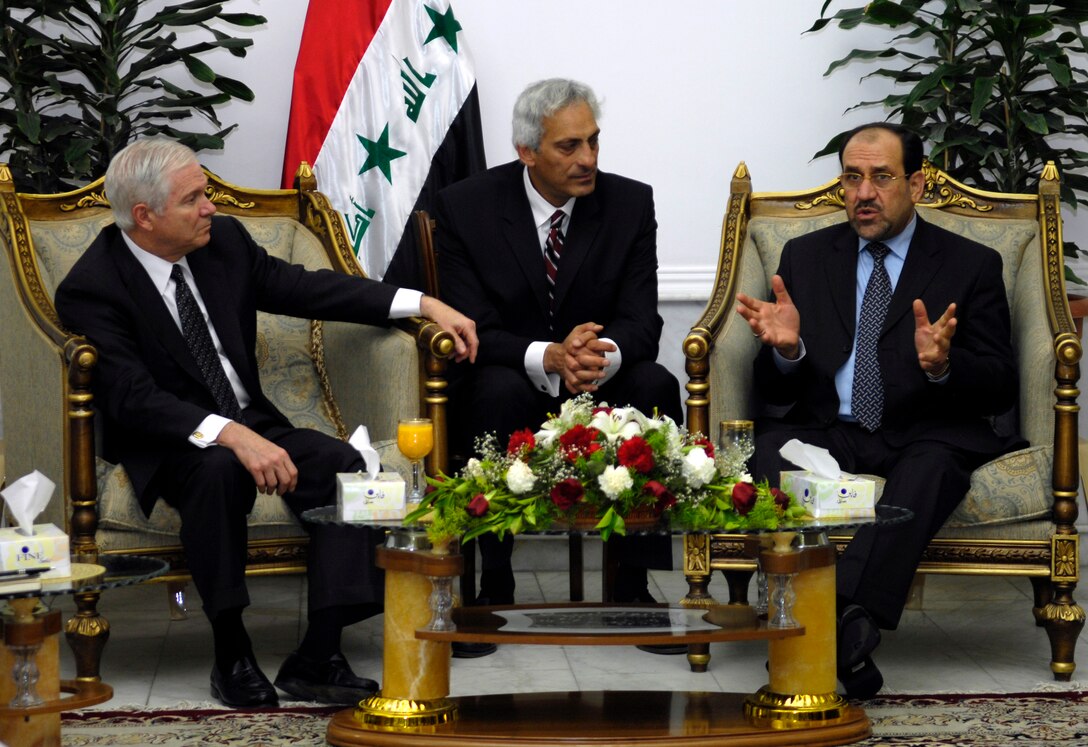 Defense Secretary Robert M. Gates speaks with Iraqi Prime Minister Nouri al-Maliki, right,  through a translator, center, in Baghdad, April 20, 2007. Gates told reporters later that he is urging the Iraqi officials to speed up national reconciliation among the country’s various factions in order to progress toward justice and reconciliation in Iraq.  