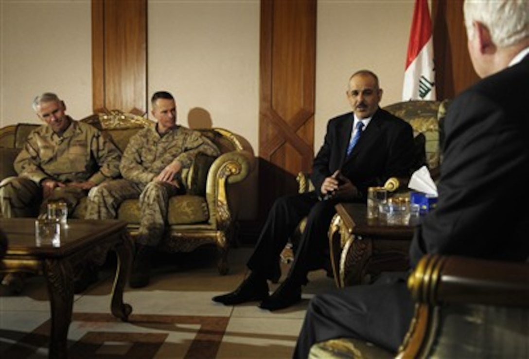 Defense Secretary Robert M. Gates meets with Iraqi Minister of Interior Juwad Bulani while Chairman of the Joint Chiefs of Staff U.S. Marine Gen. Peter Pace and U.S. Central Command Commander Adm. William Fallon look on in Baghdad,  April 20, 2007.  
