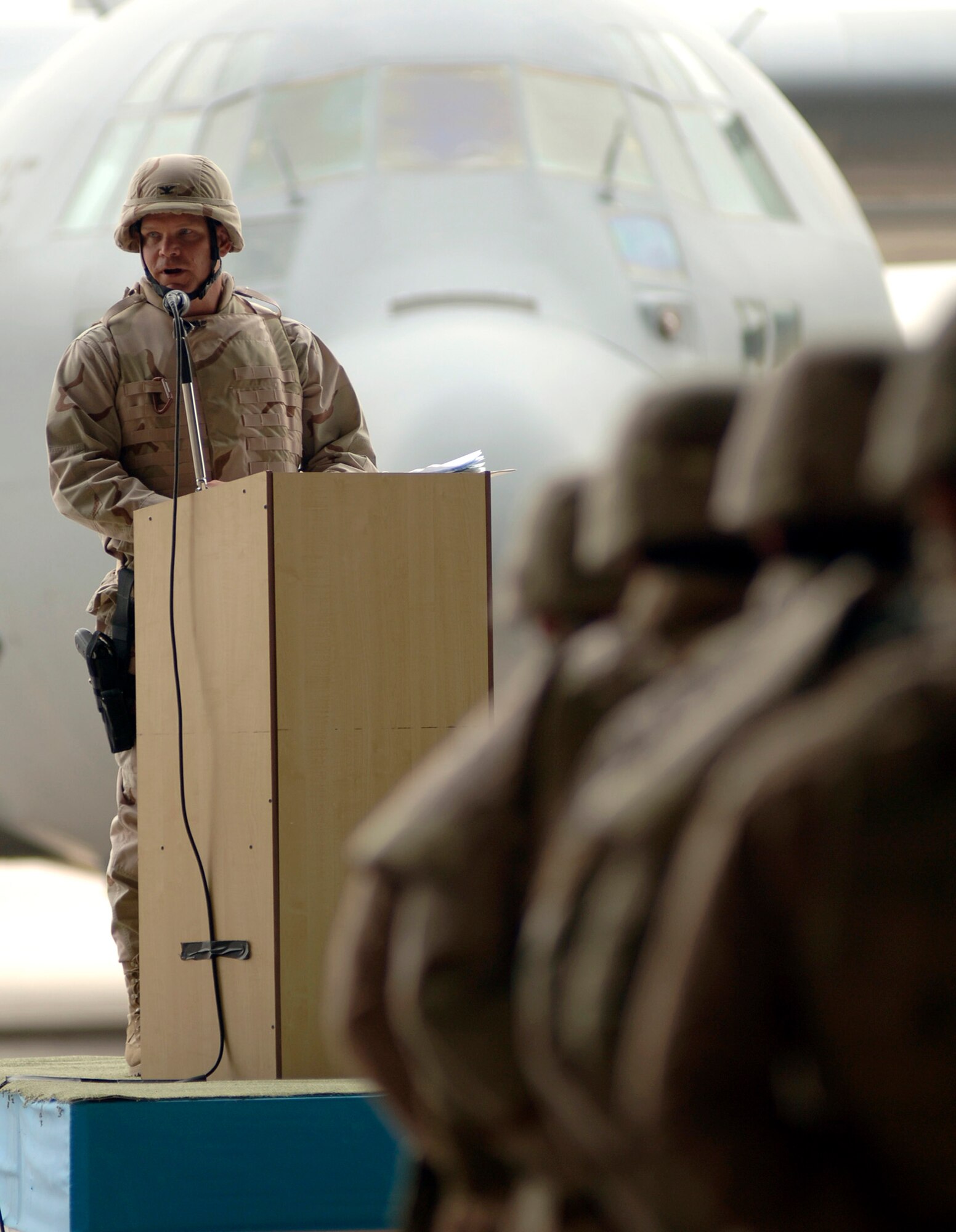 Baghdad, Iraq -- Col. Mark J. Schmitz delivers a speech after assuming command of the 370th Air Expeditionary Advisory Squadron at the New Al Muthana Air Base April 22.  (U.S. Air Force photo/Tech. Sgt. Cecilio M. Ricardo Jr.) 