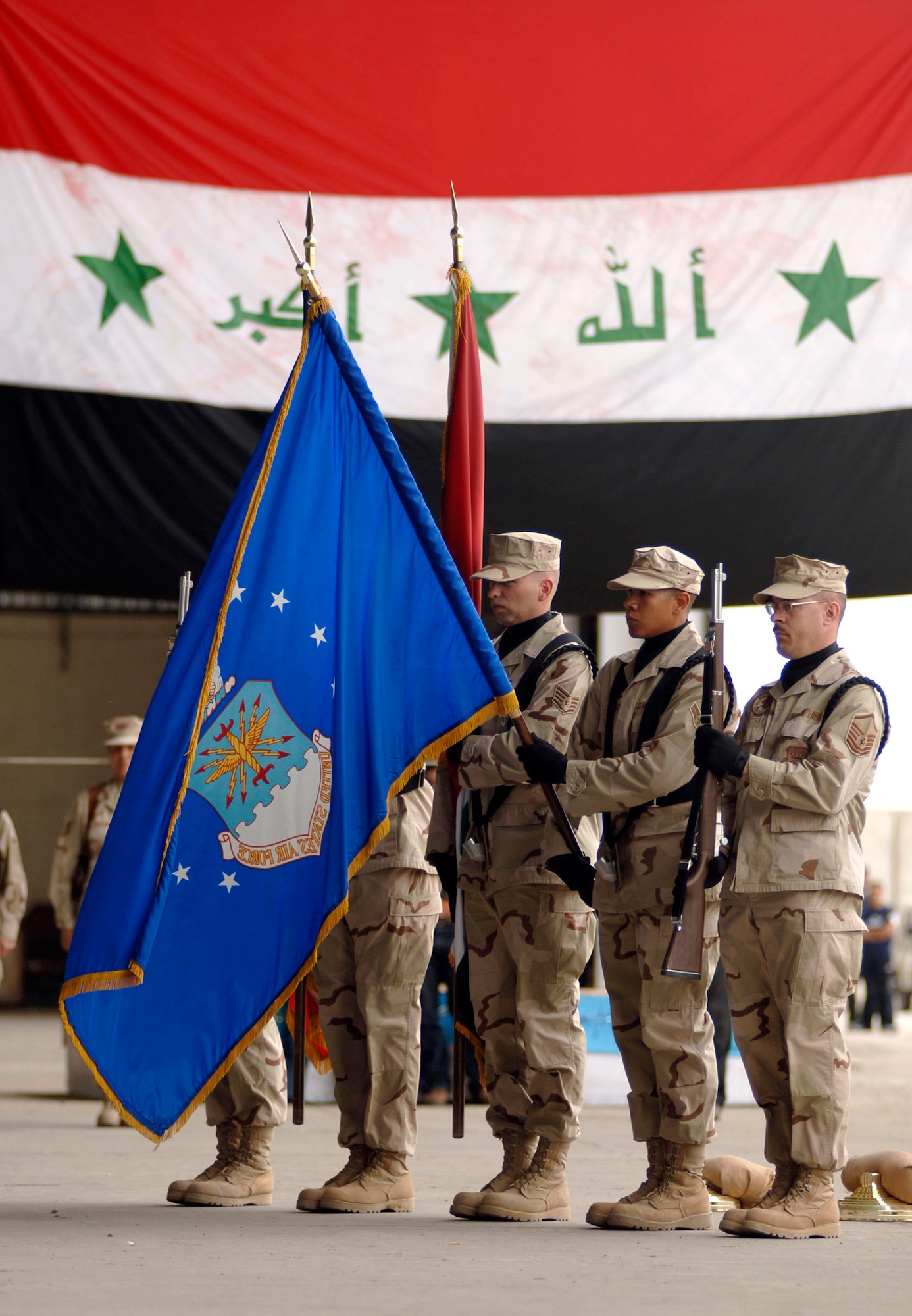 Baghdad, Iraq -- The Sather Air Base Honor Guard presents the colors at the Unit Activation and Assumption of Command Ceremony for the 370th Air Expeditionary Advisory Group to be commanded by Col. Daniel G. Groeschen on New Al Muthana Air Base April 22.  (U.S. Air Force photo/Tech. Sgt. Cecilio M. Ricardo Jr.)  