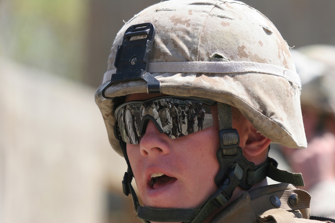 Lance Cpl. Zack K. Switzer with Weapons Platoon, Company I, Battalion Landing Team, 3rd Battalion, 8th Marine Regiment, 22nd Marine Expeditionary Unit, explains to his counterparts the importance of keeping of staying close while clearing rooms. The Marines and sailors of BLT 3/8 are scheduled to deploy as the Ground Combat Element for the 22nd Marine Expeditionary Unit later this year. (U.S. Marine Corps Photo by Sgt. Ezekiel R. Kitandwe)