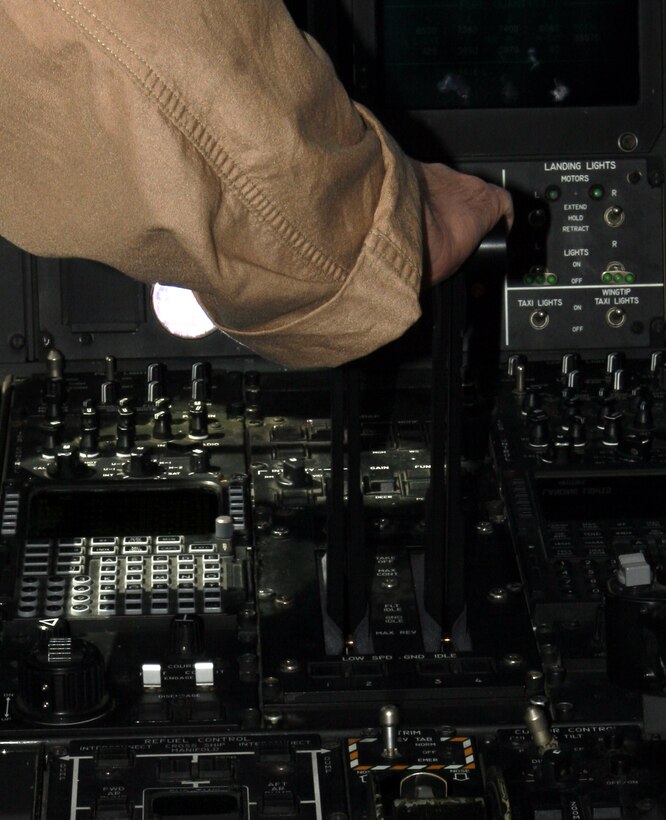 AL ASAD, Iraq - Paco, a military working dog, attacks the bite sleeve on the arm of Lance Cpl. Kyle Smith, a MWD handler, during aggression training outside the Al Asad MWD kennel. The training helps teach dogs to respond to verbal commands from their handler.
