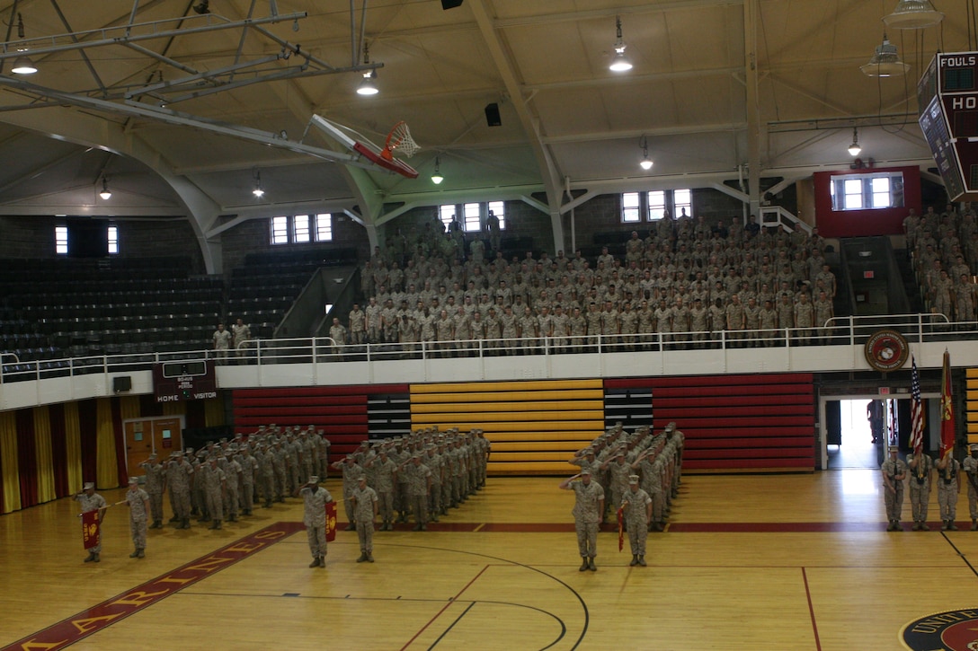 Marines with 2nd Battalion, 9th Marine Regiment, 2nd Marine Division stand at the position of attention while the National Anthem during a Relief and Appointment Ceremony at the Goettge Field House aboard Marine Corps Base Camp Lejeune, N.C. During the Ceremony Sgt. Maj. Douglas Schaefer relinquished command of 2/9 to Sgt. Maj. Brett Scheuer.