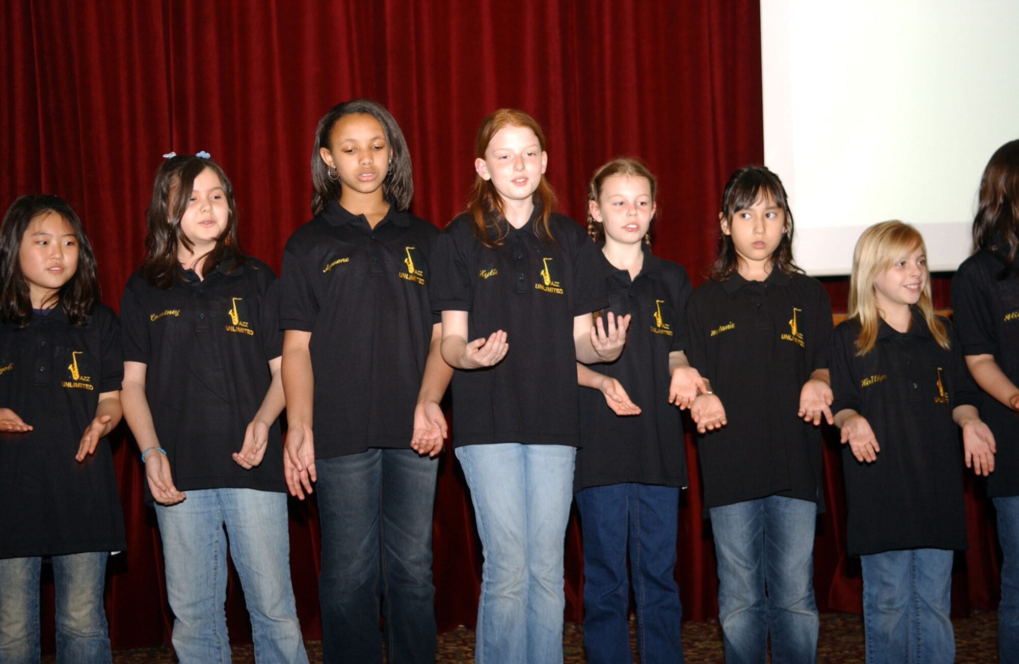 OSAN AIR BASE, Republic of Korea --  The Osan Elementary School Jazz Singers perform at the Volunteer Recognition Reception at the Officers' Club here Monday. The reception was a 'thank you' to all Team Osan volunteers for what they do for the base and local community. (U.S. Air Force photo by Staff Sgt. Ronald Hill)