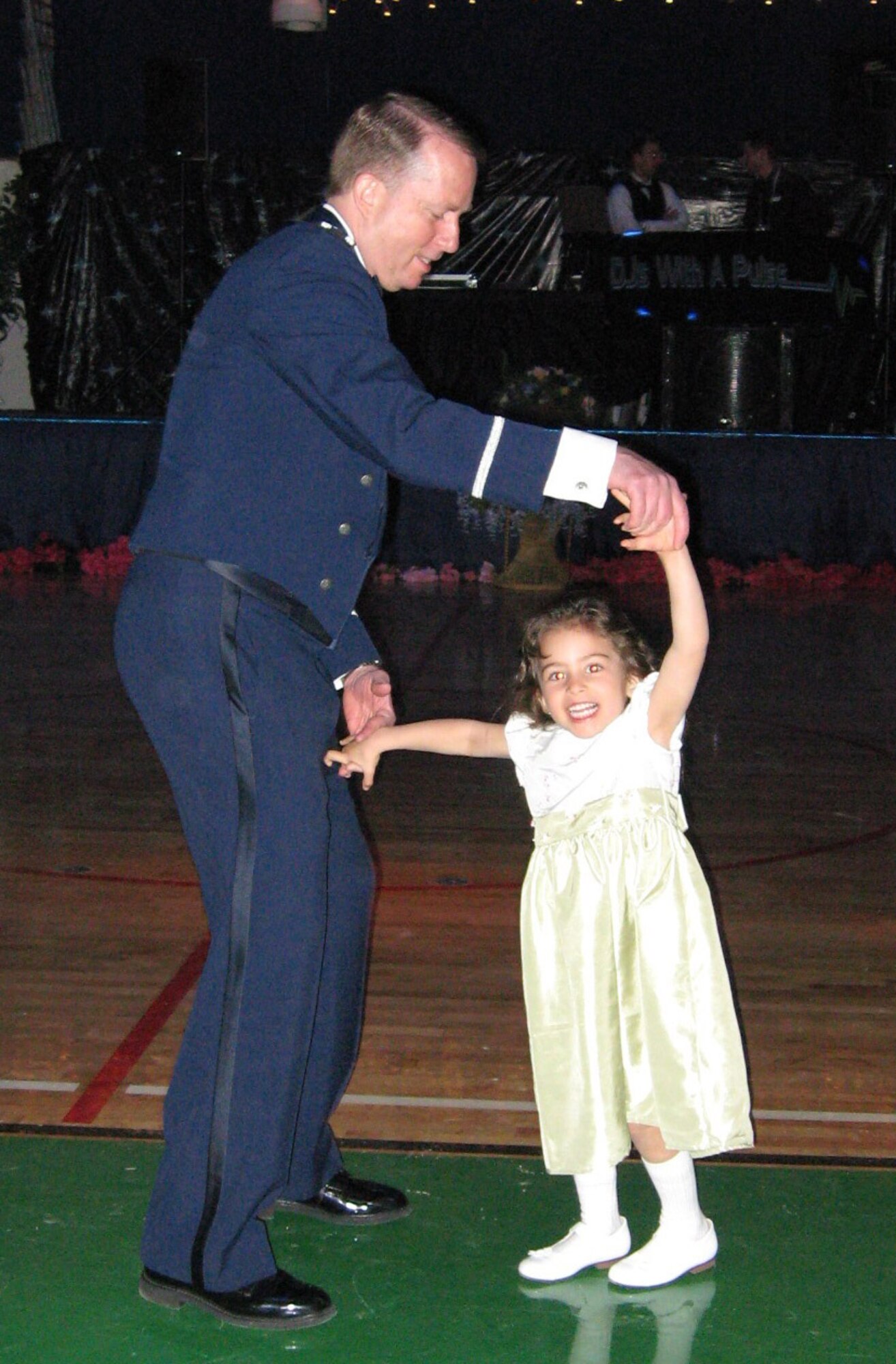 An Air Force officer dances with his daughter April 14 during the Father Daughter Dance at Fort Carson Special Events Center. More than 200 military fathers and their daughters from bases all over the Colorado Springs area attended the dance.