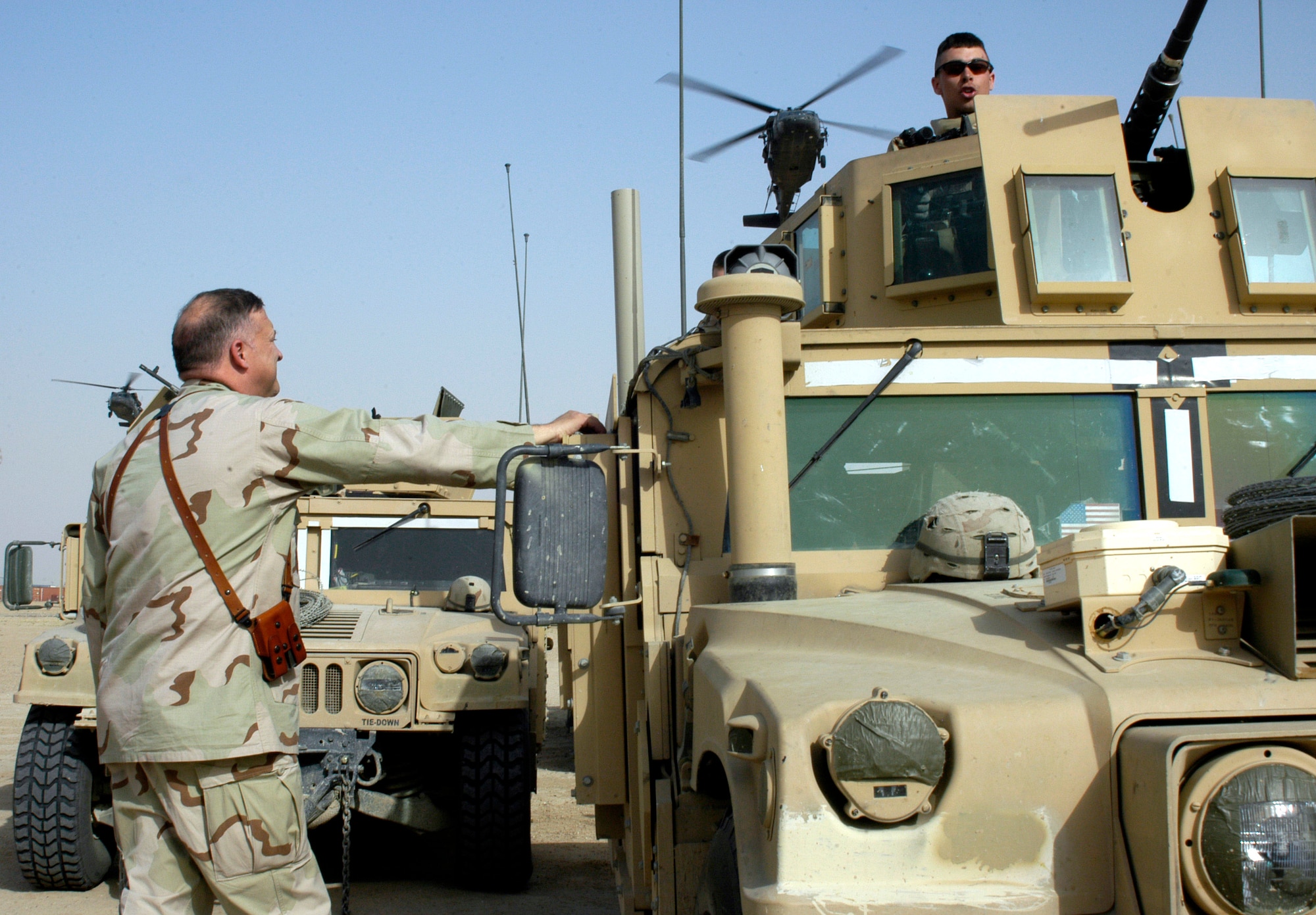 Lt. Gen. Gary L. North receives a briefing from an Airman of the 586th Expeditionary Security Forces Squadron April 20 at Camp Bucca, Iraq. Camp Bucca is one of the many places in the U.S. Central Command Air Forces area of responsibility where Airmen are doing nontraditional jobs supporting the war on terrorism. General North is the CENTAF commander. (U.S. Air Force photo/Staff Sgt. Ian Carrier)