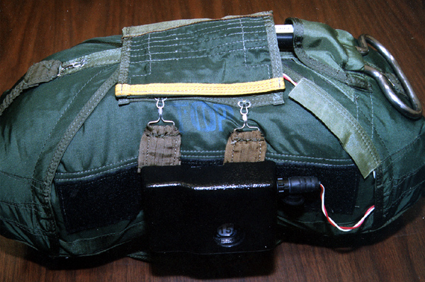 A new automatic reserve parachute opener being developed by the Army