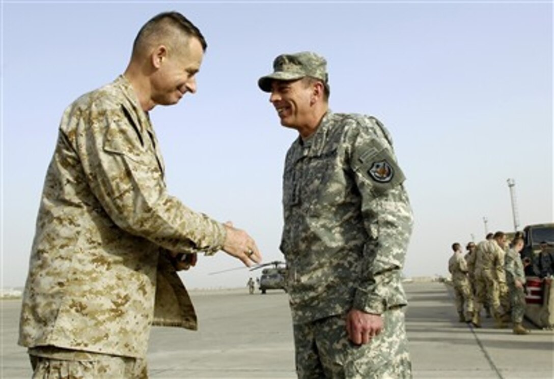 Chairman of the Joint Chiefs of Staff Gen. Peter Pace, U.S. Marine Corps, says goodbye to Army Gen. David Petraeus, commander Multinational Force Iraq, at the conclusion of his visit to Iraq, on April 20, 2007.  Pace and Secretary of Defense Robert M. Gates are in Iraq to meet with Petraeus, Marine Maj. Gen. Walter Gaskin, Commander of Multinational Forces-Iraq West, Navy Adm. William Fallon, commander of U.S. Central Command, and Army Lt. Gen. Ray Odierno, commander Multinational Corps Iraq.  