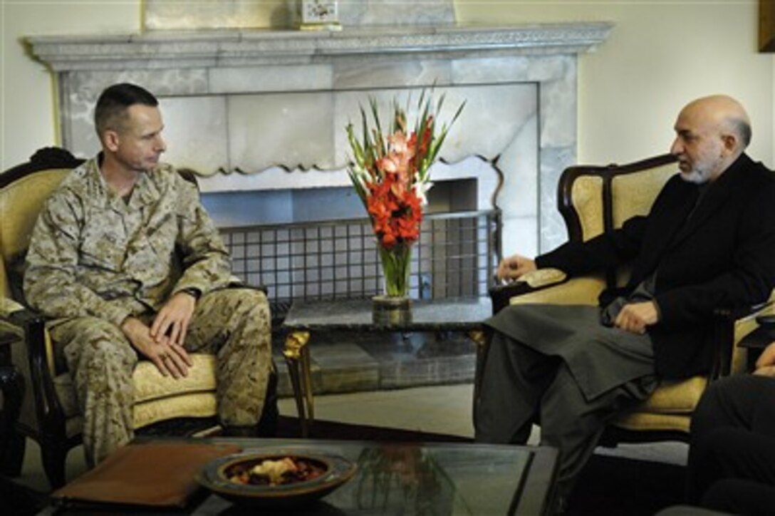 President of Afghanistan Hamid Karzai (right) meets with Chairman of the Joint Chiefs of Staff Gen. Peter Pace, U.S. Marine Corps, at the Presidential Palace in Kabul, Afghanistan, on April 21, 2007.  