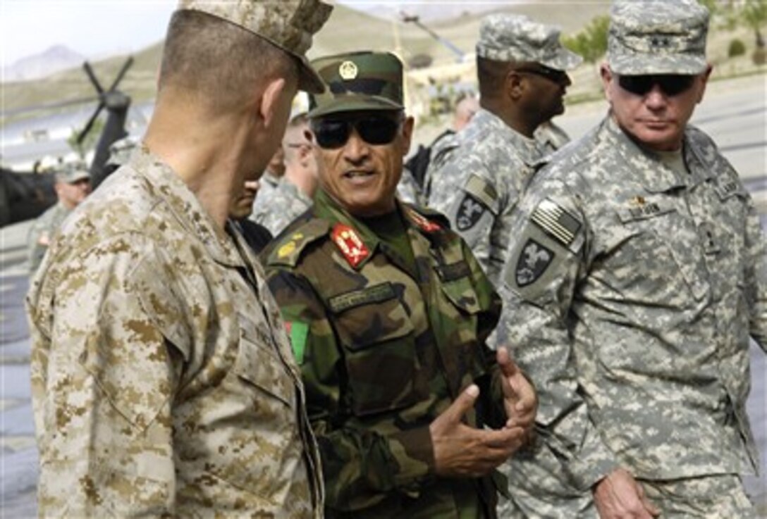 Afghan Gen. Bismullah Khan briefs Chairman of the Joint Chiefs of Staff Gen. Peter Pace (left), U.S. Marine Corps, during a visit to an Afghan military training facility in Kabul, Afghanistan, April 21, 2007.  Pace observed Afghan soldiers being trained in leadership, basic and technical military courses while visiting the center.  