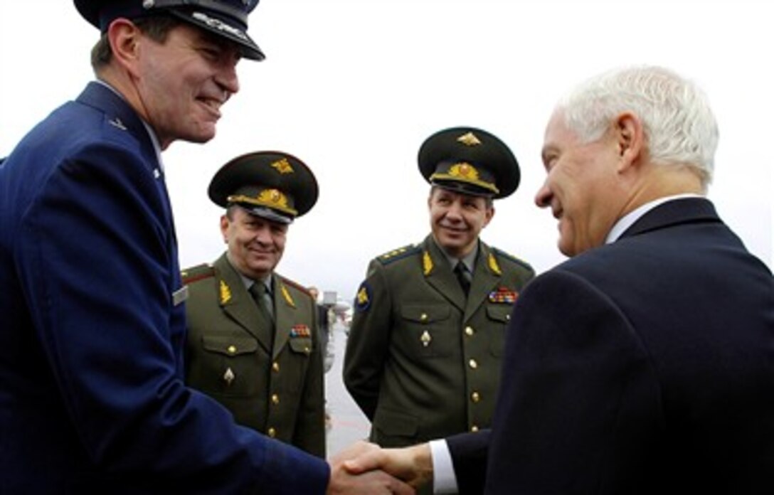 U.S. Defense Secretary Robert M. Gates meets U.S. Air Force Brig. Gen. Dan Eagle, left, defense attache, Russian General-Major Nikishin, Vladimir Ivanovich, deputy chief of International Treaties, center, and Russian General-Colonel Popovkin, Vladimir Aleksandrovich, commander of RF Space Forces, right, upon his arrival in Moscow,  April 23, 3007. 