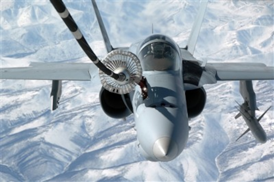 A U.S. Navy F/A-18C Hornet aircraft from Strike Fighter Squadron 87 refuels from an Air Force KC-10 Extender aircraft over the Pacific Alaska Range Complex during Exercise Red Flag-Alaska 07-1 on Eielson Air Force Base, Alaska, on April 18, 2007.  Red Flag-Alaska is a field training exercise for U.S. forces flown under simulated air combat conditions conducted on the Pacific Alaskan Range Complex with air operations flown out of Eielson and Elmendorf Air Force Bases.  