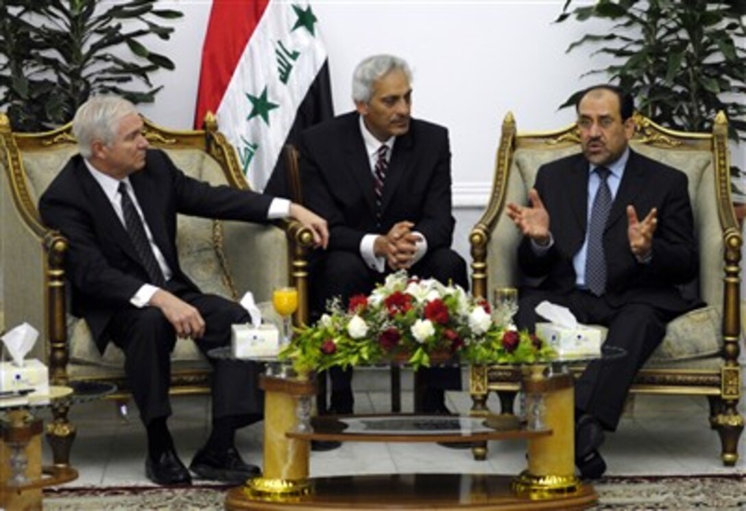 Secretary of Defense Robert M. Gates (left) listens as Iraqi Prime Minister Nouri al-Maliki (right) speaks during their meeting in Baghdad, Iraq, on April 20, 2007.  Gates is urging the Iraqi officials to speed up national reconciliation among the country's various factions in order to progress toward justice and reconciliation in Iraq.  