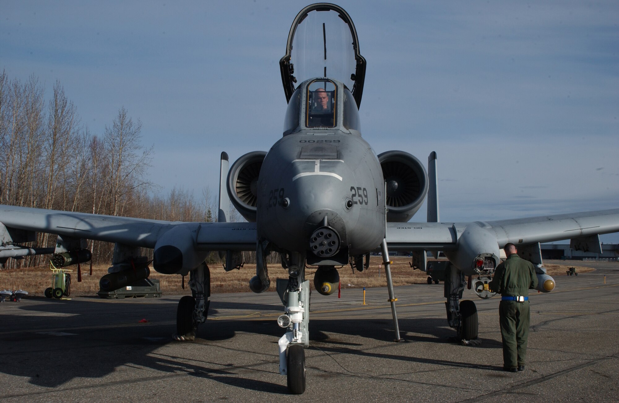 EIELSON AIR FORCE BASE, Alaska -- 1st Lt. Dale Stark, 355th Fighter Squadron, conducts a pre-flight inspection on an A/OA-10 Thunderbolt II on April 24. Due to the Base Realignment and Closure list the A-10 Thunderbolt II is being relocated to Moody AFB, Georgia. (U.S. Air Force Photo by Airman 1st Class Jonathan Snyder) 