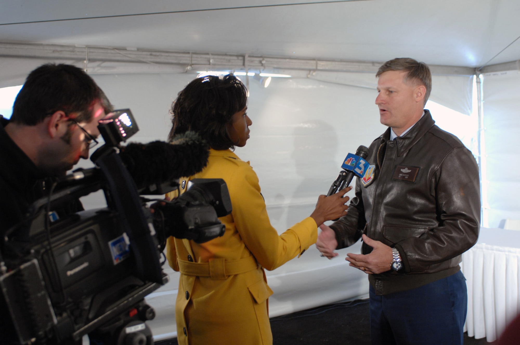 Col. Michael Bartley, 99th Air Base Wing commander, receives an interview by members of the media at the Nellis Air Force Base solar power system's ground breaking ceremony, April 23.The Nellis solar power plant, scheduled for completion late 2007. The array is the largest photo-voltaic project in North America. The power plant will produce approximately 15 megawatts of power and provide nearly 30 percent of the electricity demand on the base which employs 12,000 people. (U.S. Air Force photo/Senior Airman Jason Huddleston)
