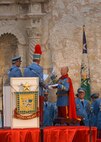 King Antonio LXXXV, Joe Peacock Jr., takes the oath before being crowned April 21 during this year's investiture at Alamo Plaza as Fiesta celebrations get underway. Fiesta is a 10-day event with more than 100 scheduled events designed to honor the heroes of the Alamo and the Battle of San Jacinto. (USAF photo by Alan Boedeker)                               