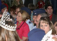 Mary Wilbur, wife of Col. Eric Wilbur, watches intently as King Antonio LXXXV is officially given reign of the city.  She and Colonel Wilbur, the 37th Training Wing vice commander at Lackland Air Force Base, Texas, represented Team Lackland at the investiture April 21 at Alamo Plaza. Fiesta is a 10-day event with more than 100 scheduled events designed to honor the heroes of the Alamo and the Battle of San Jacinto. (USAF photo by Alan Boedeker)                               