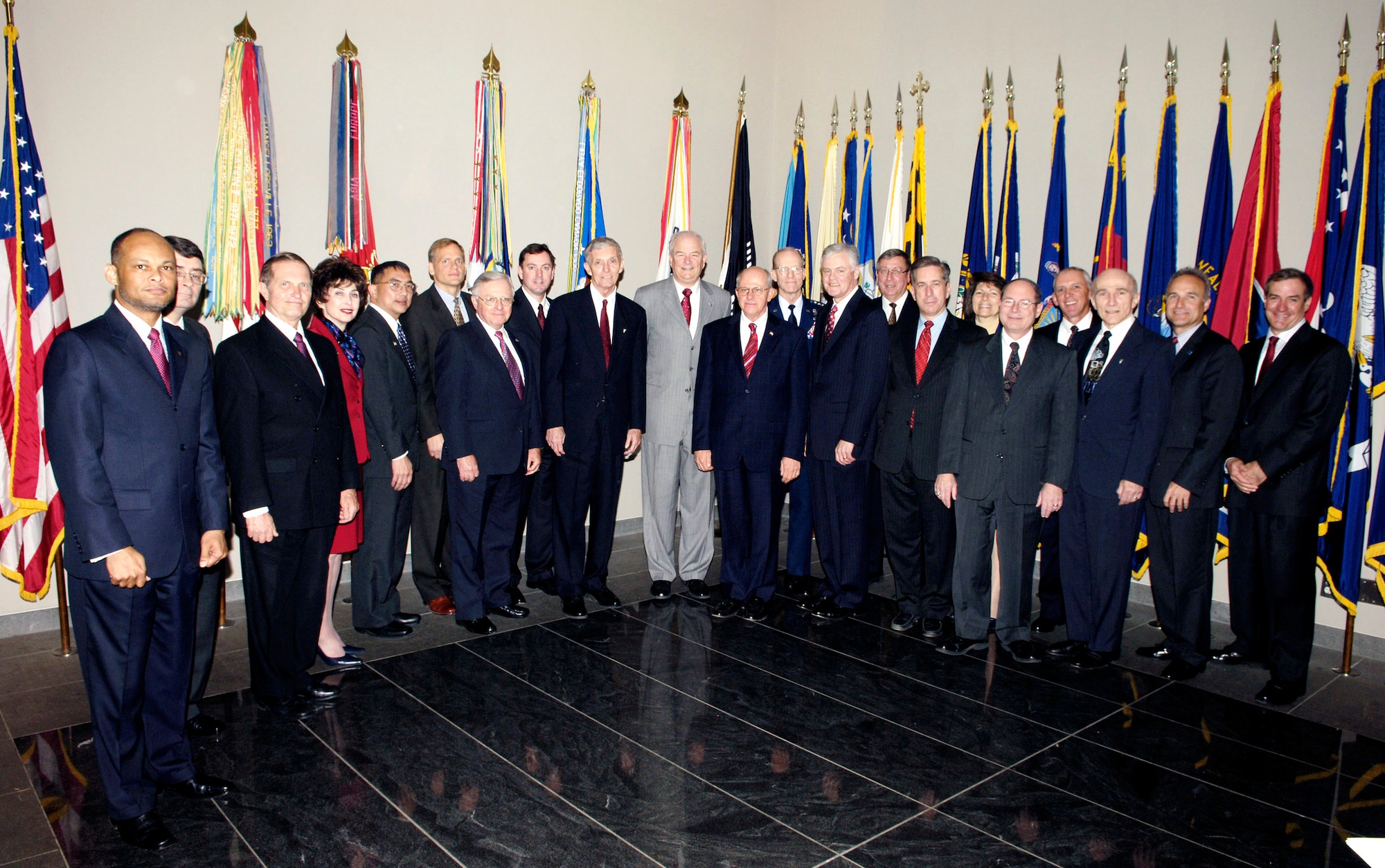 Secretary of the Air Force Michael Wynne, center, stands with the 2006 Presidential Rank Award recipients after a ceremony held April 20 at the Women's Memorial in Arlington National Cemetery in Washington D.C. (U.S. Air Force photo)