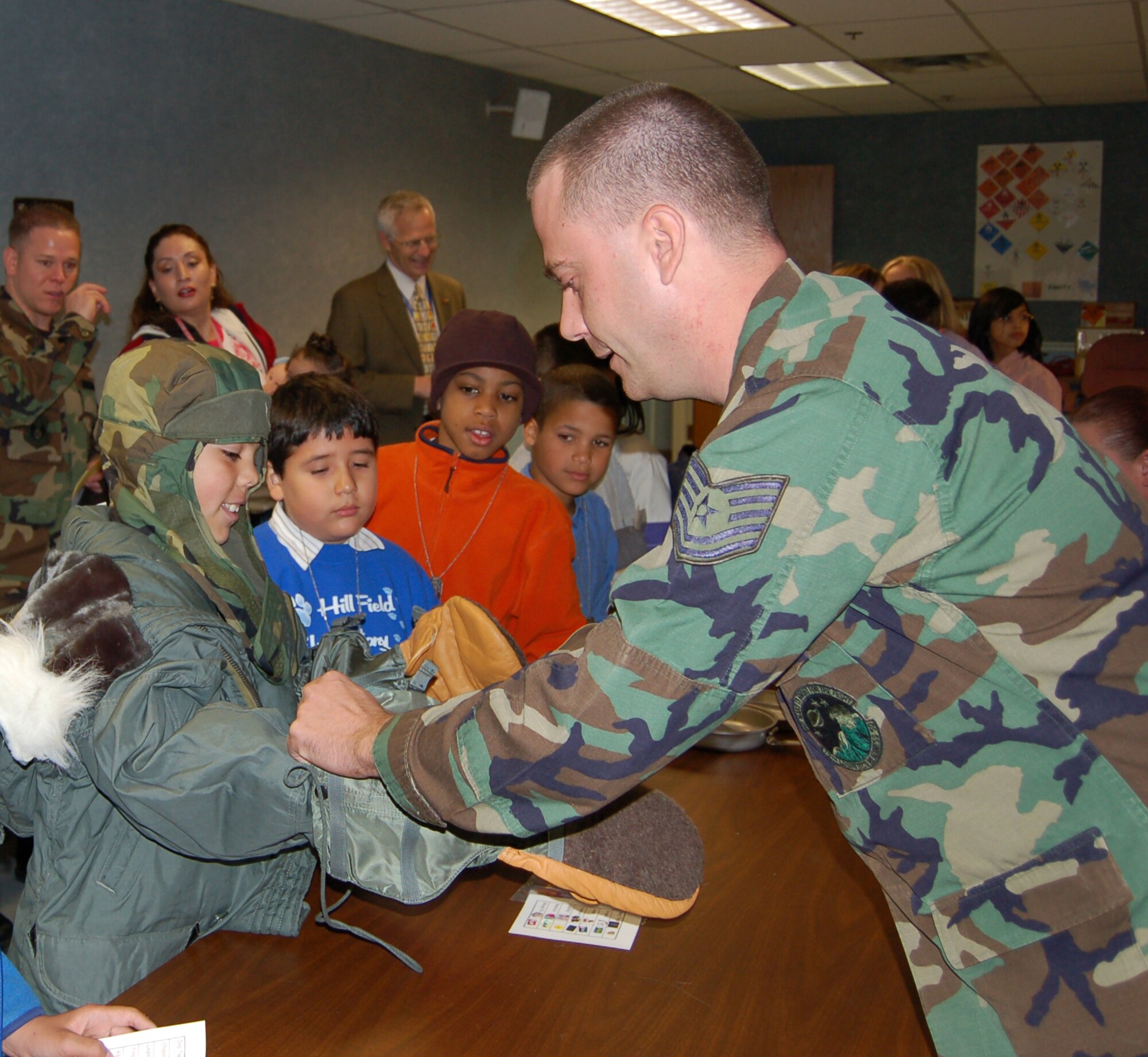 Attendees of Kid's Deployment Day had the chance to try gas masks, cold weather gear and other things their military parents use on deployments. Photos by Beth Young