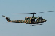A 6th Special Operations Squadron UH-1N Huey helicopter flies the pattern at Hurlburt Field, Fla.  The 6th SOS is the only unit in the Department of Defense to perform the aviation foreign internal defense mission.  Combat aviation FID advisors at the 6th advise, train and assist friendly nations in their organic aircraft.  As such, 6th SOS Air Commandos operate aircraft commonly found in foreign air forces. (US Air Force photo by Chief Master Sgt. Gary Emery)