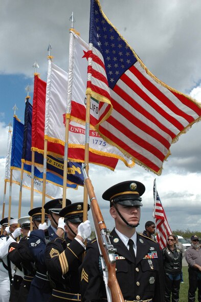 A Joint Service Honor Guard stands in formation before the Presentation of the Colors at the Sacramento Valley Veterans Affairs National Cemetery dedication ceremony April 22 in Dixon, Calif. (U.S. Air Force photo by Jennifer Brugman)