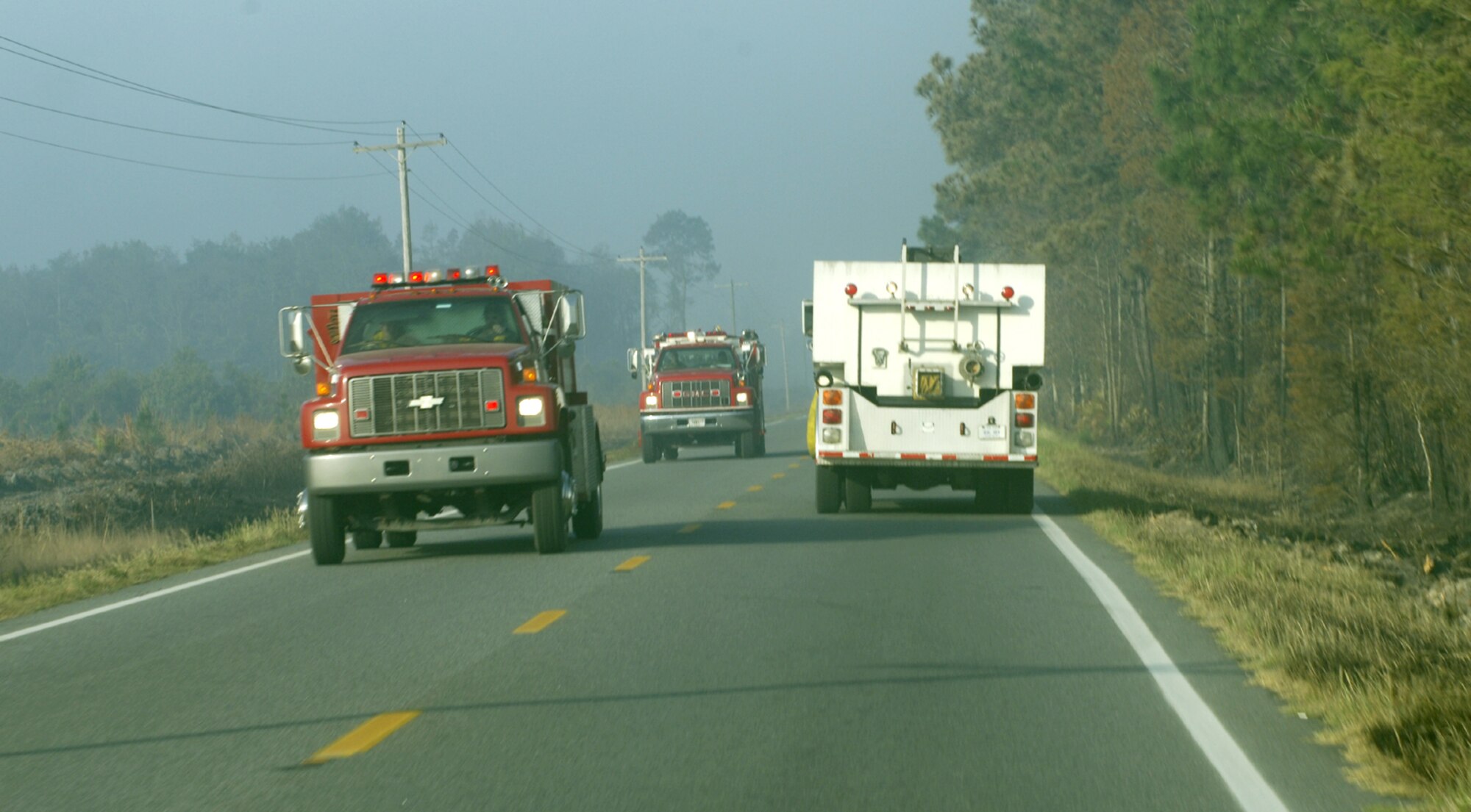Moody firefighters rush to the scene of the fire Saturday to perform a support role of ensuring other departments have sufficient amounts of water. The flight performs this mission by using a tanker that can hold 5,000 gallons of water, which can fill up to five fire trucks. (U.S. Air Force photo by Senior Airman Javier Cruz)