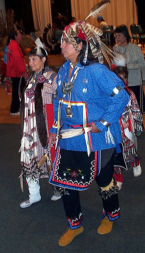 Boe Harris-Nakakakena, the head woman dancer at Bolling Air Force Bases Veterans Powwow, performs a dance with the Powwows head male dancer, Seneca Indian Michael Nephew. Harris is a member of the Turtle Mountain Chippewa of Turtle Mountain, N.D. Photo by Rudi Williams