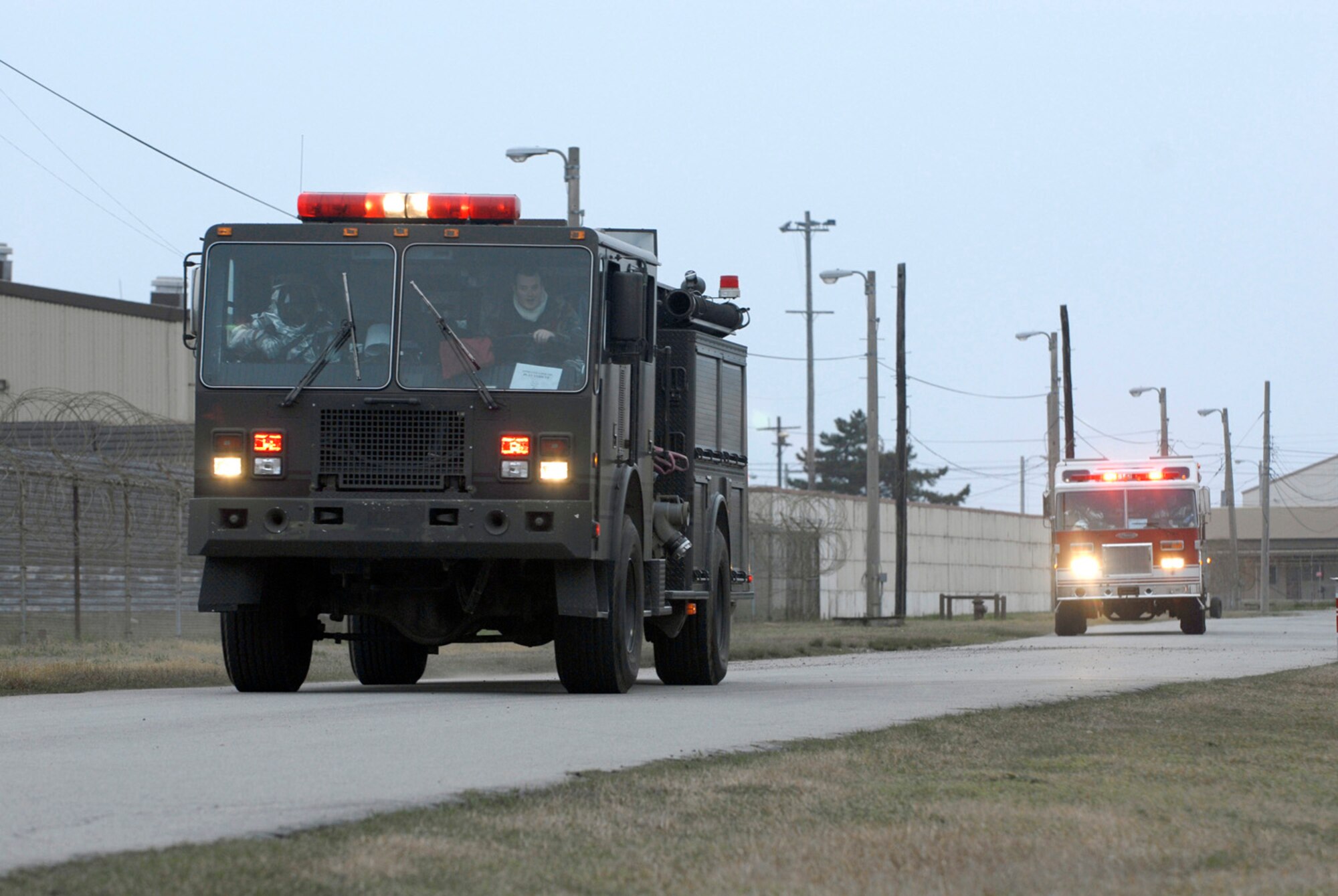 KUNSAN AB, Republic of Korea ? Firefighters from the 8th Civil Engineer Squadron responds to a simulated fire during an exercise scenario here April 17. The 8th Fighter Wing is currently undergoing an operational readiness inspection to test its ability to conduct its wartime mission. (U.S. Air Force photo by Senior Airman Darnell T. Cannady)  