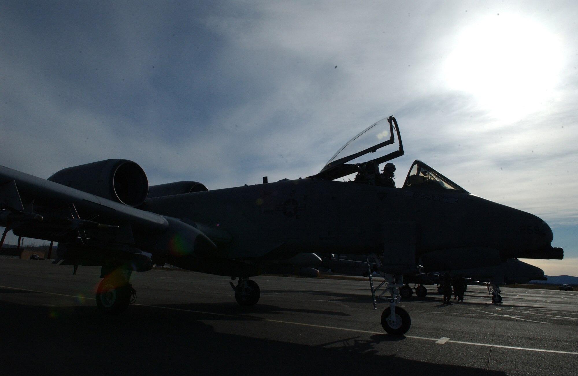 EIELSON AIR FORCE BASE, Alaska -- 1st Lt. Dale Stark, 355th Fighter Squadron, waits in his A/OA-10 Thunderbolt II to be loaded with ammunition on April 24. Due to the Base Realignment and Closure list the A-10 Thunderbolt II is being relocated to Moody AFB, Georgia. (U.S. Air Force Photo by Airman 1st Class Christopher Griffin) 