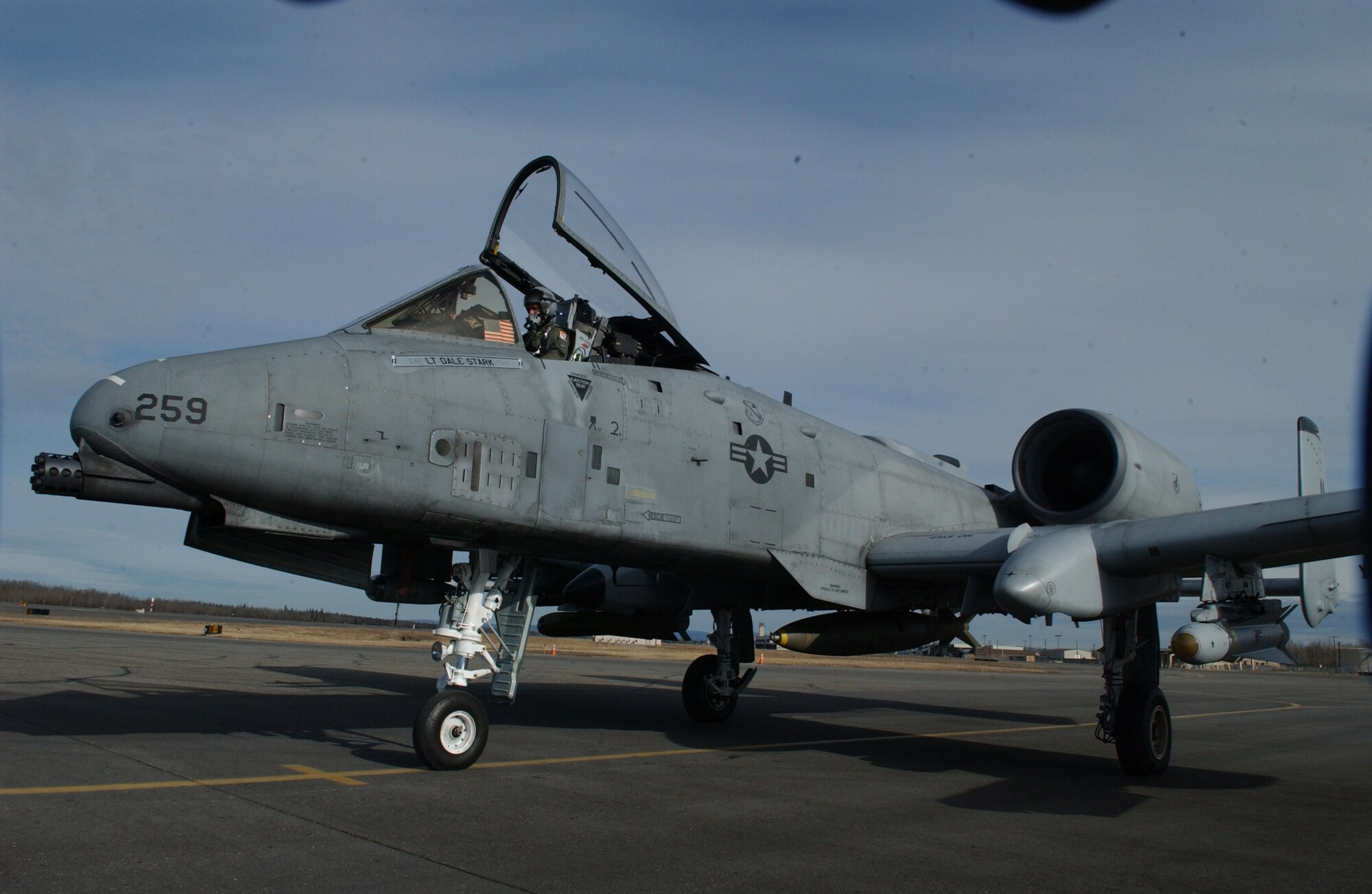 EIELSON AIR FORCE BASE, Alaska -- 1st Lt. Dale Stark, 355th Fighter Squadron, waits in his A/OA-10 Thunderbolt II to be loaded with ammunition on April 24. Due to the Base Realignment and Closure list the A-10 Thunderbolt II is being relocated to Moody AFB, Georgia. (U.S. Air Force Photo by Airman 1st Class Christopher Griffin) 