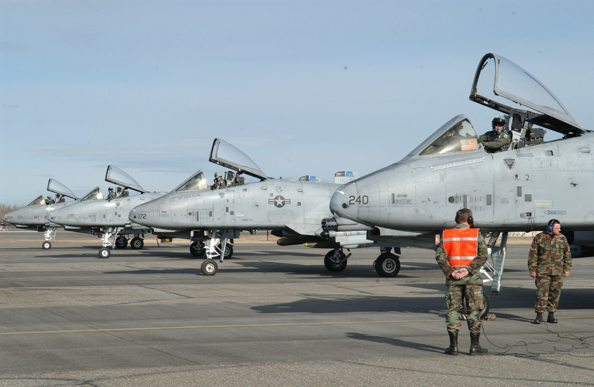 EIELSON AIR FORCE BASE, Alaska -- Four A/OA-10 Thunderbolt II, 355th Fighter Squadron, sit in position at the end of runway to be armed by Airmen from the 354th Aircraft Maintenance Squadron on April 24. Due to the Base Realignment and Closure list the A-10 Thunderbolt II is being relocated to Moody AFB, Georgia. (U.S. Air Force Photo by Airman 1st Class Christopher Griffin) 