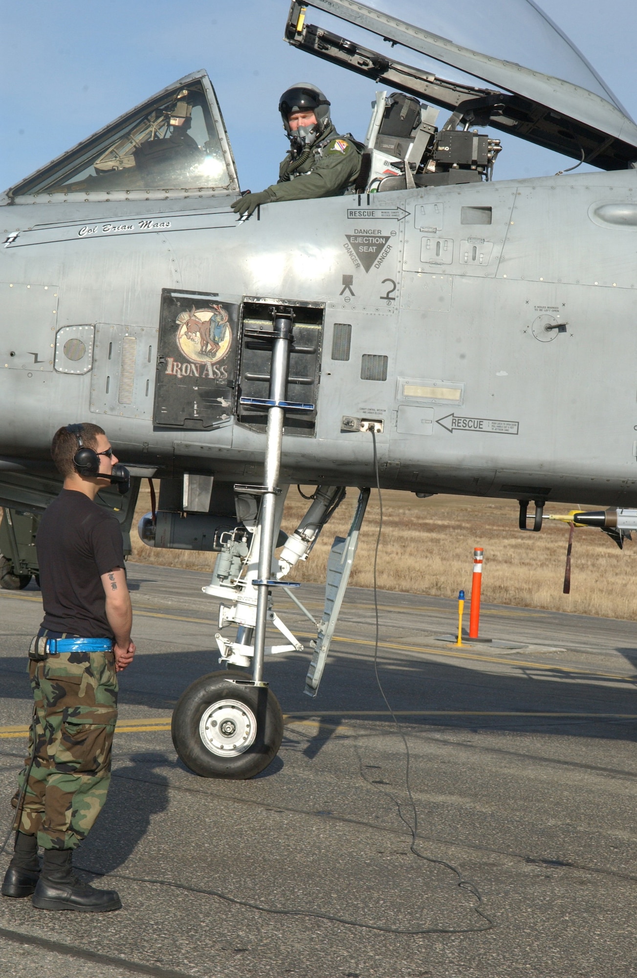 EIELSON AIR FORCE BASE, Alaska - Captain Will Reynolds (Neo), 355th Fighter Squadron, Airman 1st Class Cory Mellot 354 Aircraft Maintenance Squadron, both go through a pre-flight inspection on an A/OA-10 Thunderbolt II on April 24. Due to the Base Realignment and Closure list the A-10 Thunderbolt II is being relocated from Eielson AFB to Moody AFB, Georgia. (U.S. Air Force Photo by Airman 1st Class Christopher Griffin) 