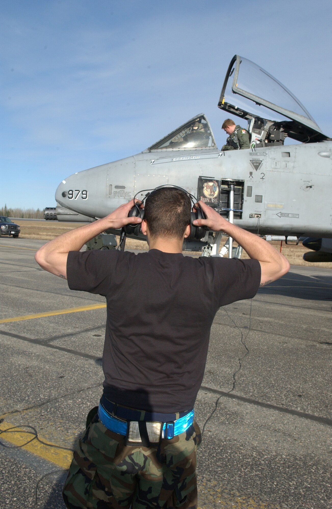 EIELSON AIR FORCE BASE, Alaska - Captain Will Reynolds (Neo), 355th Fighter Squadron, Airman 1st Class Cory Mellot 354 Aircraft Maintenance Squadron, both go through a pre-flight inspection on an A/OA-10 Thunderbolt II on April 24. Due to the Base Realignment and Closure list the A-10 Thunderbolt II is being relocated from Eielson AFB to Moody AFB, Georgia. (U.S. Air Force Photo by Airman 1st Class Christopher Griffin) 