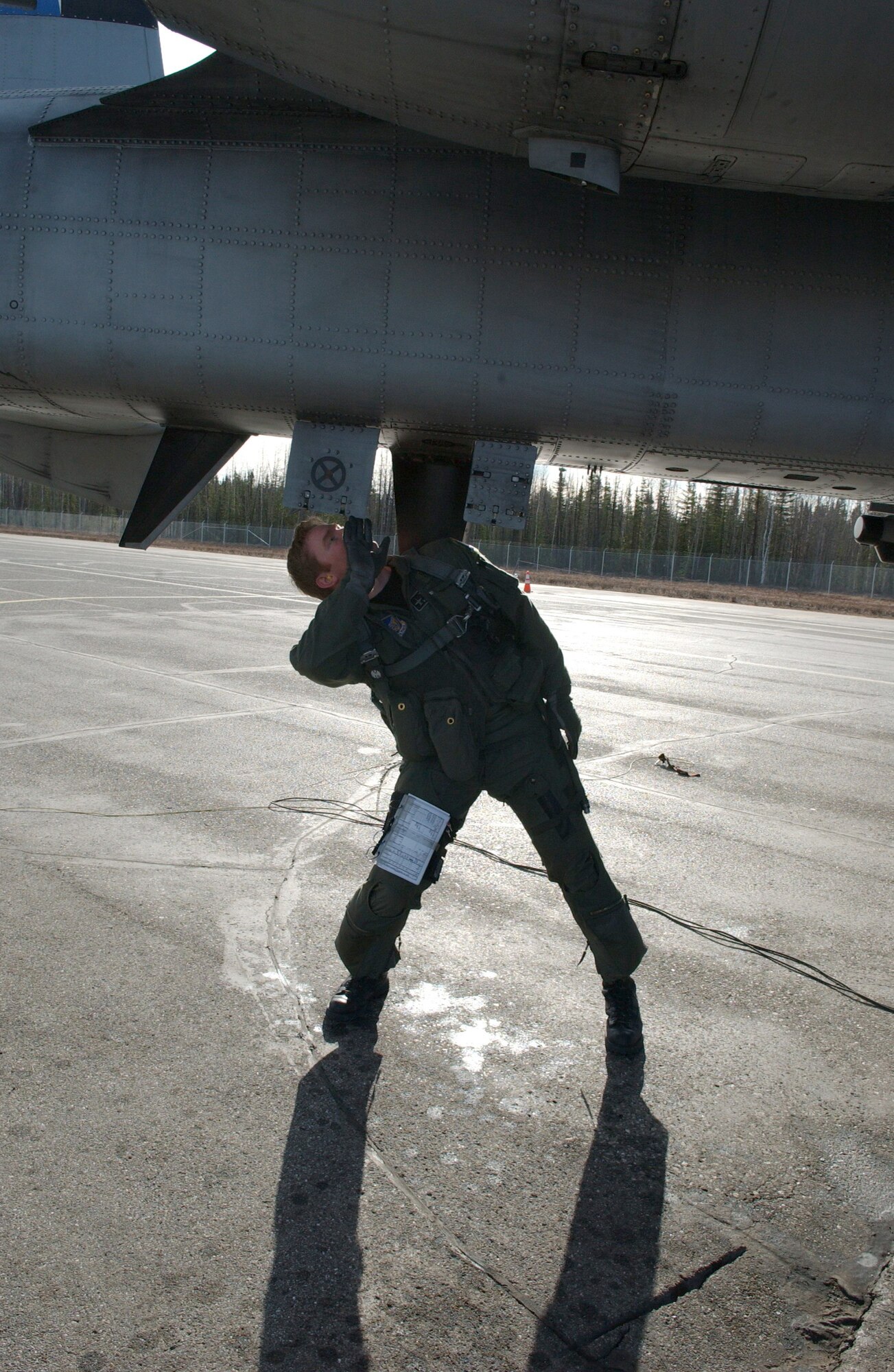 EIELSON AIR FORCE BASE, Alaska - Captain Will Reynolds (Neo), 355th Fighter Squadron, conducts a pre-flight inspection on an A/OA-10 Thunderbolt II on April 24. Due to the Base Realignment and Closure list the A-10 Thunderbolt II is being relocated to Moody AFB, Georgia. (U.S. Air Force Photo by Airman 1st Class Christopher Griffin)