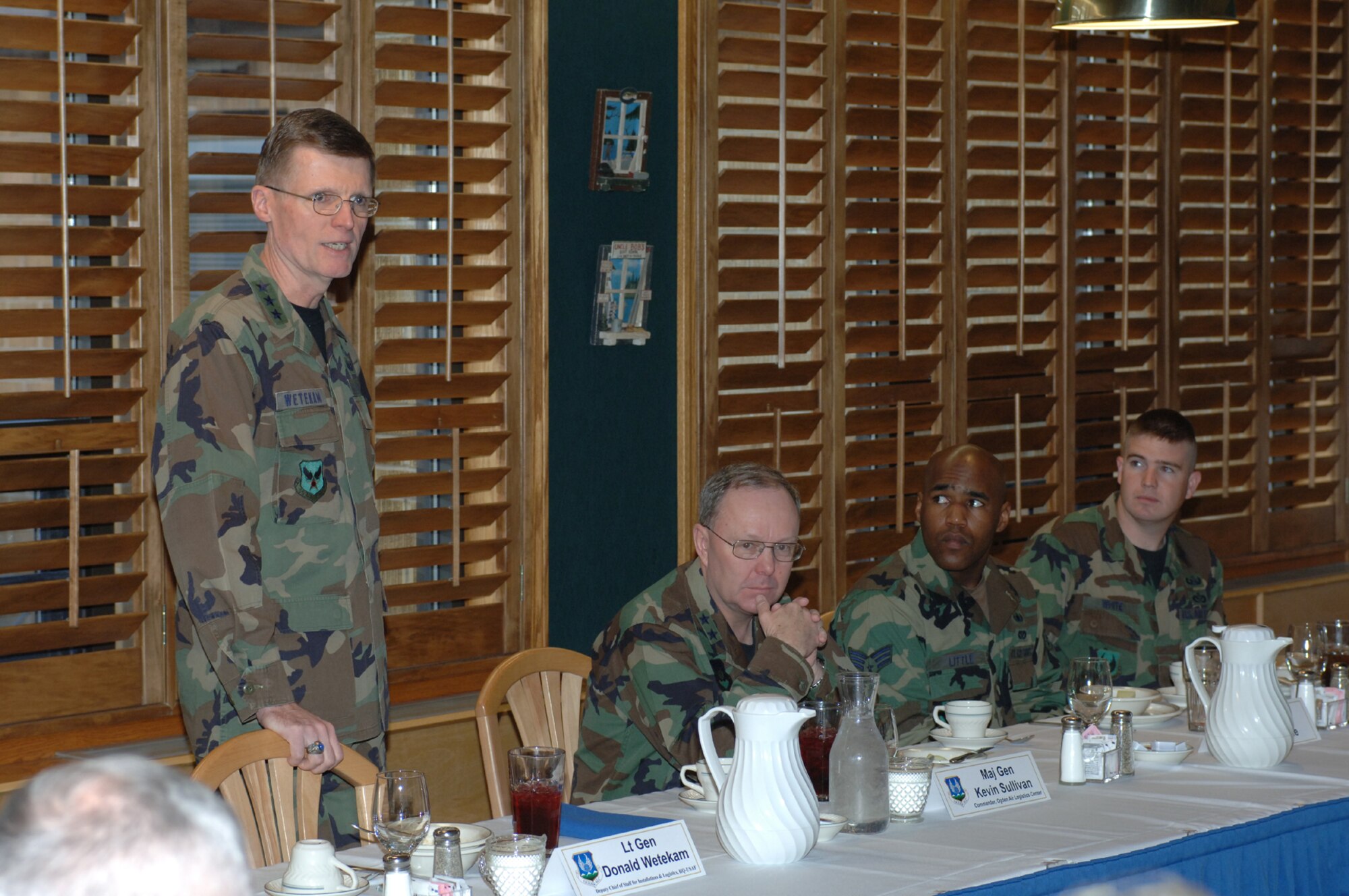 Lt. Gen. Donald Wetekam (left), Deputy Chief of Staff for Installations and Logistics, Headquarters U.S. Air Force, Washington, D.C., answers a question posed to him during a breakfast held at the Hillcrest Dining facility while (left to right) Maj. Gen. Kevin Sullivan, Ogden Air Logistics Center commander, Senior Airman Gevoyd Little III, 775th Civil Engineer Squadron and Staff Sgt. William White, 775 CES listen. Photo by Alex R. Lloyd
