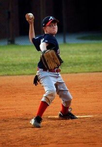 R.J. Keur, 11, son of Ronald, Youth Sports and Fitness Director, and Claudia Keur, pitches the ball for the Charleston AFB Braves in their game against the Summerville Majors Tuesday. (U.S. Air Force photo/Staff Sgt. April Quintanilla)