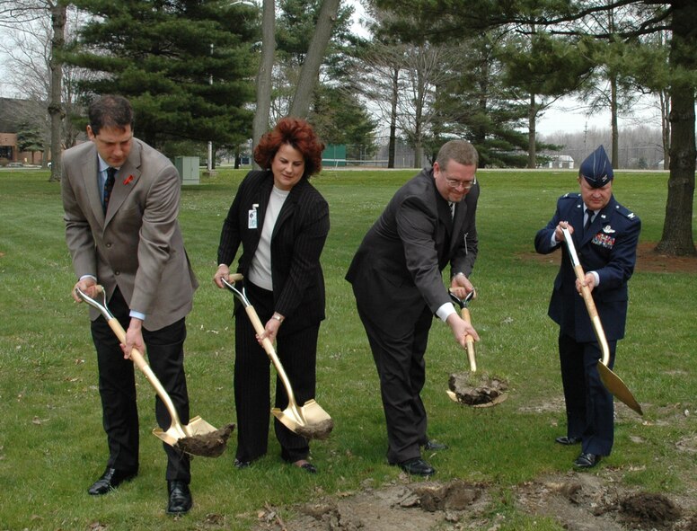 YOUNGSTOWN AIR RESERVE STATION, Ohio — Ground was broken here April 23 for the $7.5 million joint services lodging project, the first part of a four-phase plan to provide lodging for 338 Reservists.  Doing the honors at the groundbreaking ceremony are, from the left, U.S. Rep. Timothy J. Ryan (D-17, OH); Karen Halsey, owner of Better Built Construction Services; Howard Argueda, contract manager for Jack Gibson Construction Services, and Col. Timothy J. Thomson, commander of the 910th Airlift Wing.  Phase one is scheduled for completion in April 2008.  U.S. Air Force Photo/Capt. Brent J. Davis  