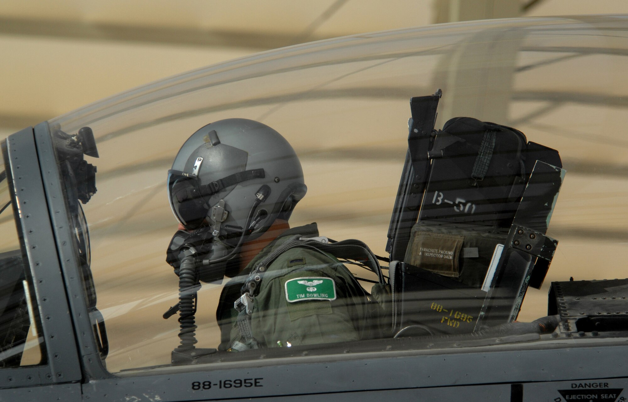 1st Lt. Tim Dowling makes final pre-flight checks on an F-15E Strike Eagle during Exercise Green Flag April 24 at Nellis Air Force Base, Nev. Green Flag is Air Combat Command's premier pre-deployment exercise for units who perform close-air support. The training exercise, which began April 19 and runs through May 4, mirrors many of the irregular warfare-conditions the F-15E aircrews will see while fighting the war on terrorism. During Green Flag, aircrews will try to learn better ways to employ airpower within an irregular warfare environment. Lieutenant Dowling is a pilot with the 335th Fighter Squadron Fighter at Seymor Johnson AFB, N.C. (U.S. Air Force photo/Master Sgt. Kevin J. Gruenwald) 
