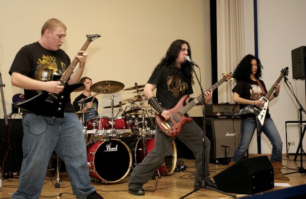 SPANGDAHLEM AIR BASE, GERMANY -- Monotor, a Spangdahlem band, performs at the Spangdahlem Skyline prior to the special premier of “300” for an audience of more than 250 people. The staff at the Skyline has more bands on tap for this summer as pre-movie entertainment and stand alone concert performances, along with special give-a-way. (US Air Force photo/Staff Sgt. Ray Mills)