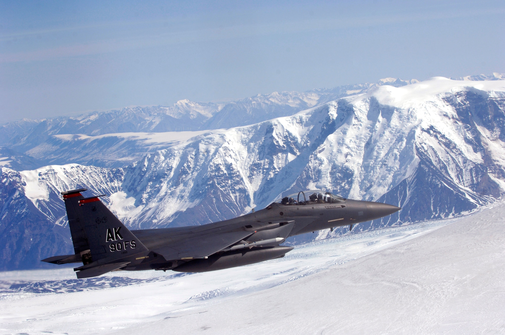 An F-15E Strike Eagle flys along the Wrangell and St. Elias Mountain Range during a training mission April 20 over Alaska. The F-15E is assigned to the 90th Fighter Squadron at Elmendorf Air Force Base, Alaska, which traces its history back to August 1917. The F-15E at Elmendorf AFB will soon be replaced by the F-22 Raptor. (U.S. Air Force photo/Tech. Sgt. Keith Brown)

