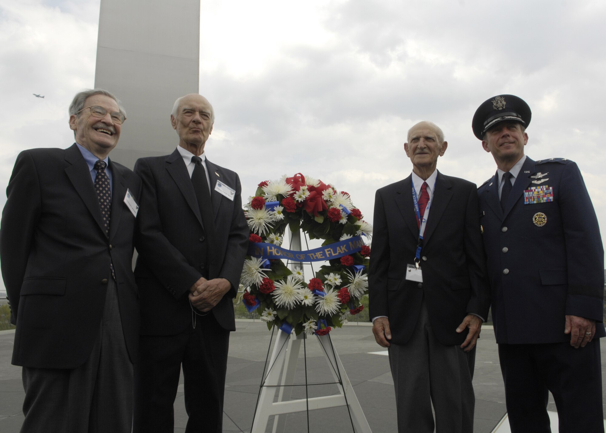 Maj. Gen. Robert L. Smolen, Air Force District of Washington commander, hosts the Air Force Wreath Laying Ceremony in honor of the Flak Man crew at the Air Force Memorial, Arlington, Va., April 24. The wreath was placed by Edward McNally, the Bombardier of the B-24 Bomber, The Flak Man, in honor of the former crew members of the Flak Man who dedicated their lives to the cause of freedom. (U.S. Air Force photo by Senior Airman Rusti Caraker)  